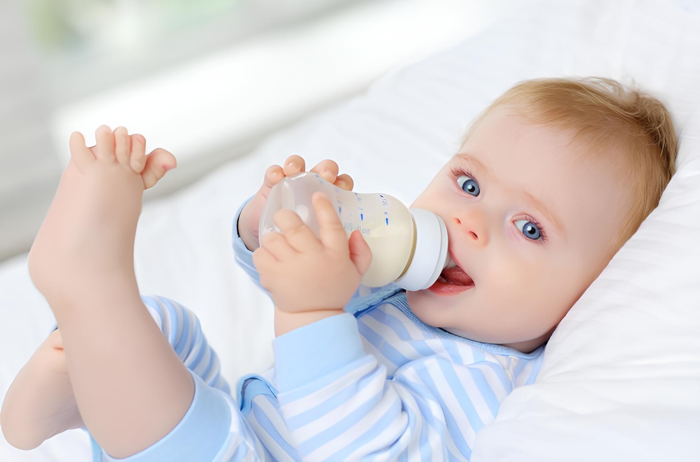 Portable bottle warmer for travel with dual heating modes for breastmilk and water